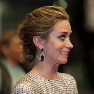 Actress Emily Blunt reacts as she leaves following the screening of the film Sicario at the 68th international film festival, Cannes, southern France, Tuesday, May 19, 2015. (AP Photo/Lionel Cironneau)