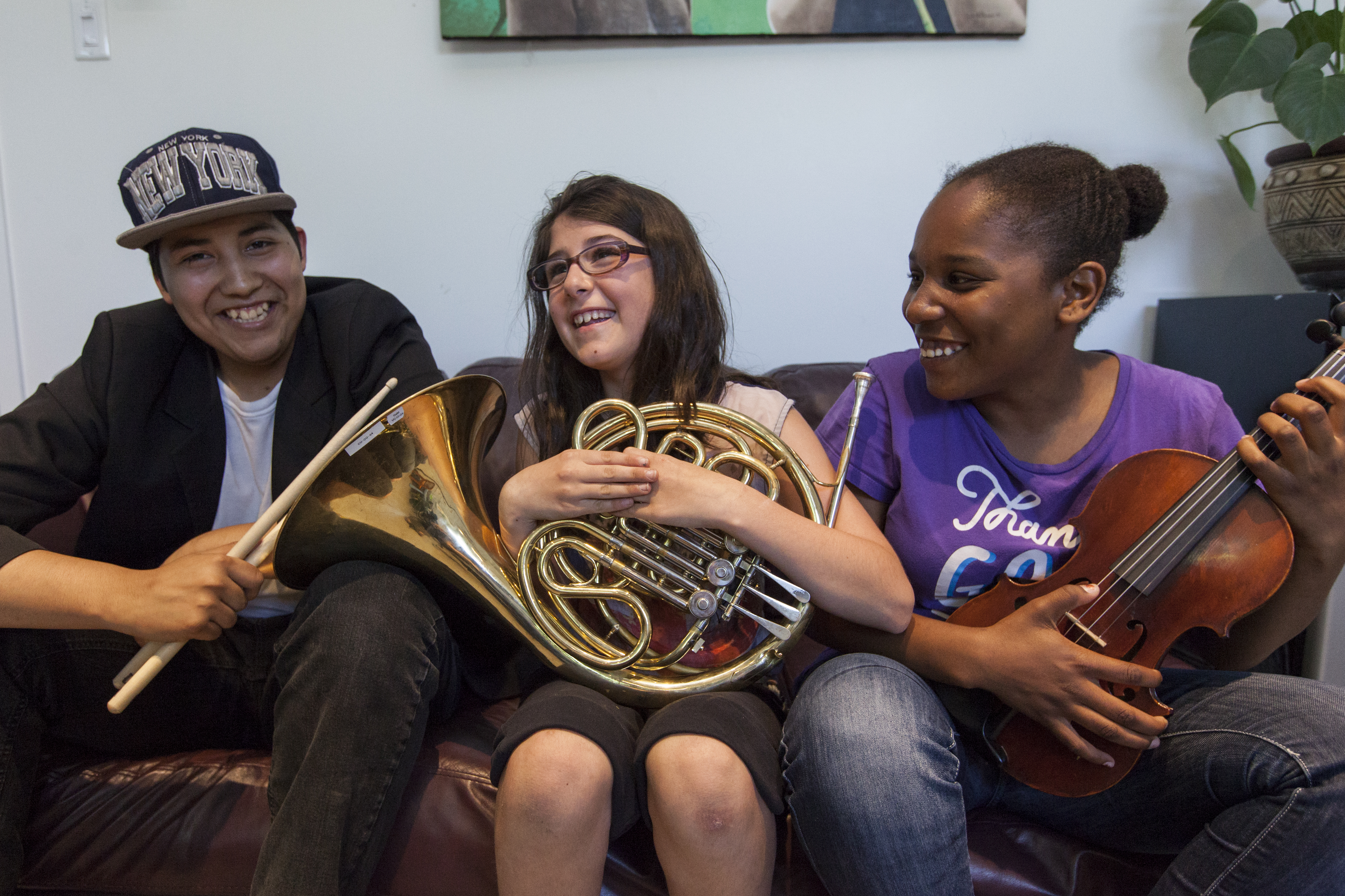 Samuel, Éliane et Joanny de l'orchestre du Garage à musique.