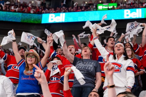 MONTREAL, QC - MAY 09: Fans enjoy the atmosphere in Game Five of the Eastern Conference Semifinals between the Montreal Canadiens and the Tampa Bay Lightning during the 2015 NHL Stanley Cup Playoffs at the Bell Centre on May 9, 2015 in Montreal, Quebec, Canada. The Canadiens defeated the Lightning 2-1. The Lightning lead the series 3-2. (Photo by Minas Panagiotakis/Getty Images)