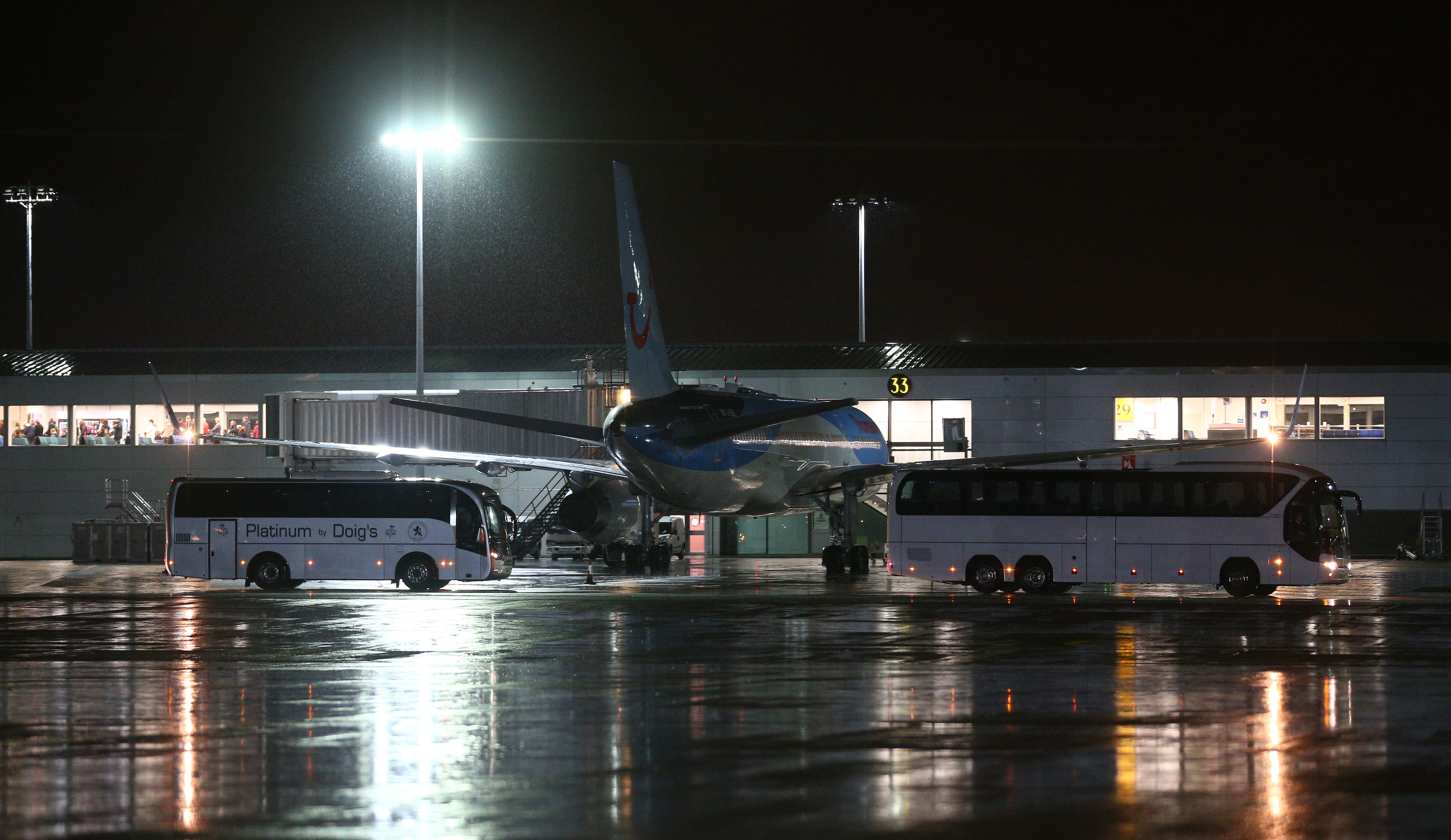 Syrian Refugees Arrive At Glasgow Airport