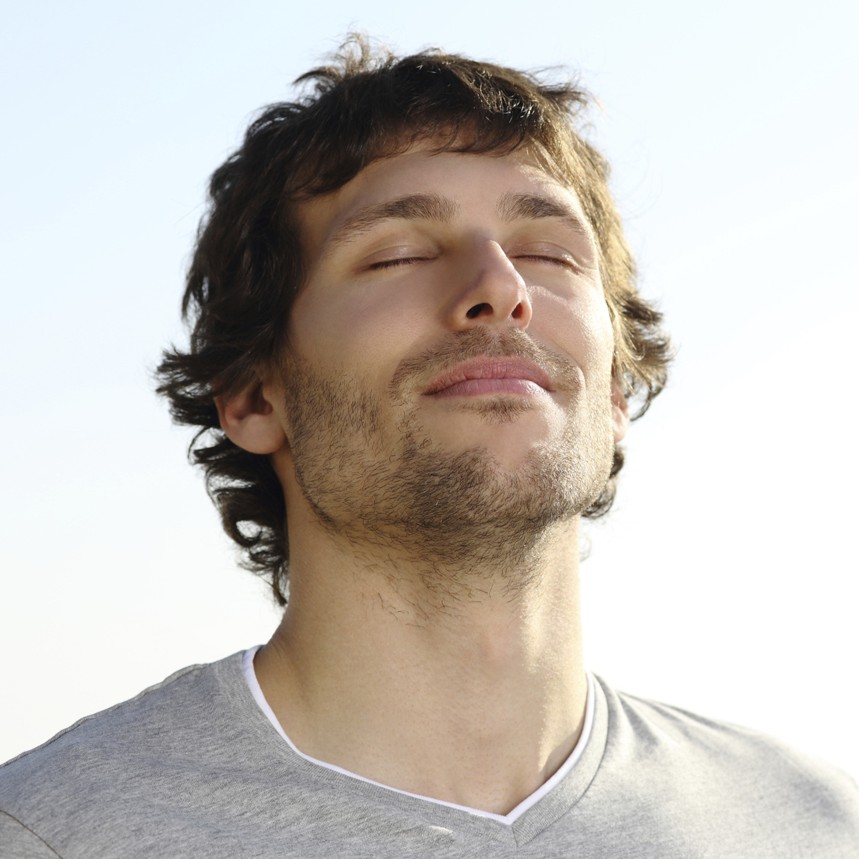 Attractive man breathing outdoor