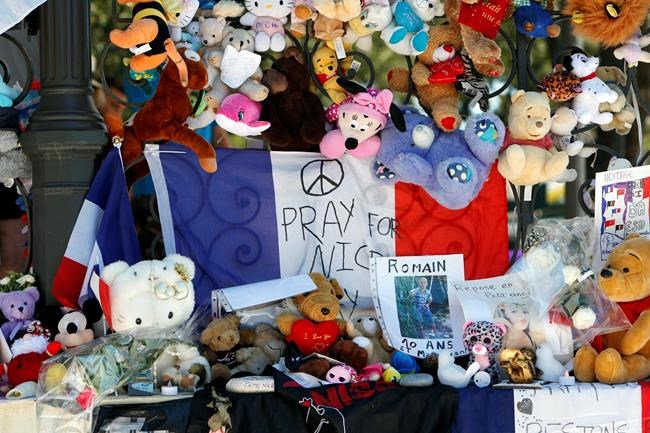 Claude Paris / The Associated Press