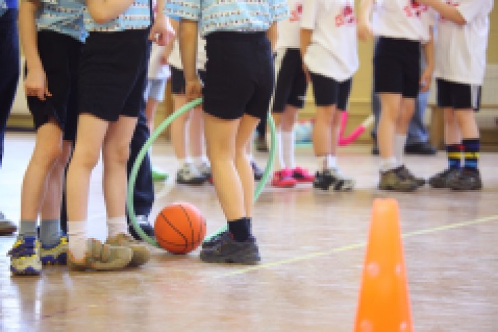 Children's feet in sports hall