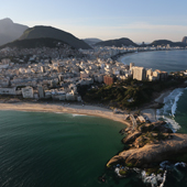 RIO DE JANEIRO, BRAZIL - JULY 04: Ipanema beach (L), Arpoador rock (BOTTOM) and Copacabana Beach (TOP C), one of the Olympic venue locations, stand on July 4, 2016 in Rio de Janeiro, Brazil. July 5 marks the one-month mark to the beginning of the Rio 2016 Olympic Games with an economic crisis, political turmoil and Zika virus fears roiling the country. (Photo by Mario Tama/Getty Images)
