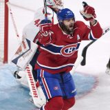 Montreal Canadiens' Alexander Radulov, from Russia, celebrates after scoring the first goal against Washington Capitals goaltender Vitek Vanecek, from the Czech Republic, during first period NHL pre-season hockey action Tuesday, September 27, 2016 in Montreal. THE CANADIAN PRESS/Ryan Remiorz