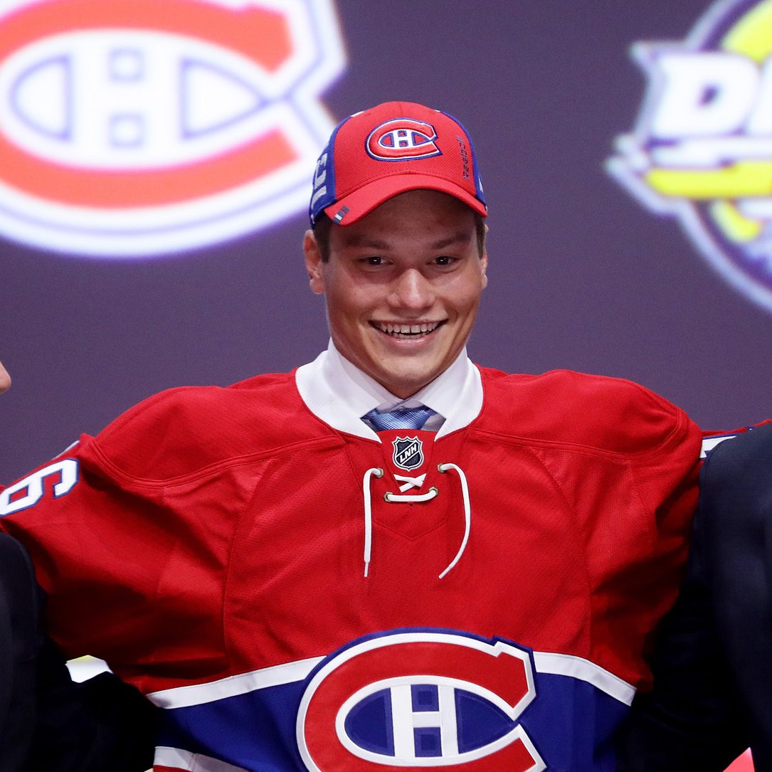 BUFFALO, NY - JUNE 24: Mikhail Sergachev celebrates with the Montreal Canadiens after being selected ninth overall during round one of the 2016 NHL Draft on June 24, 2016 in Buffalo, New York. (Photo by Bruce Bennett/Getty Images)