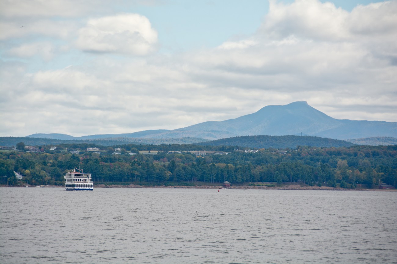 Sightseeing ship with Camel's Hump in distance