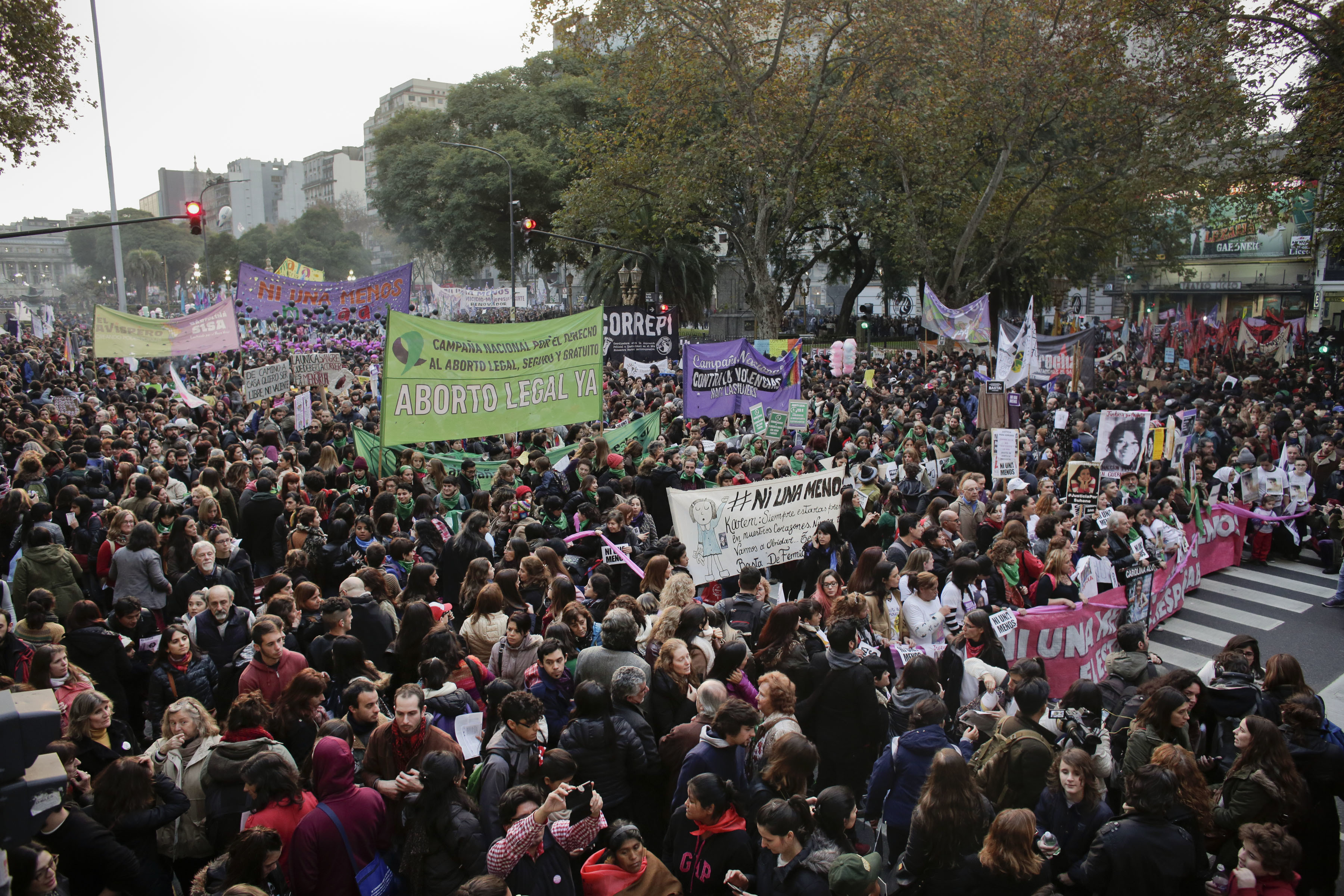 Thousands of demonstrators march against domestic violence outside the National Congress in Buenos Aires, Argentina, Friday, June 3, 2016. Women's rights group Casa del Encuentro reports 275 femicides or gender-based killing of women in the past year. (AP Photo/Victor R. Caivano)