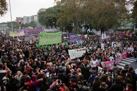 Thousands of demonstrators march against domestic violence outside the National Congress in Buenos Aires, Argentina, Friday, June 3, 2016. Women's rights group Casa del Encuentro reports 275 femicides or gender-based killing of women in the past year. (AP Photo/Victor R. Caivano)