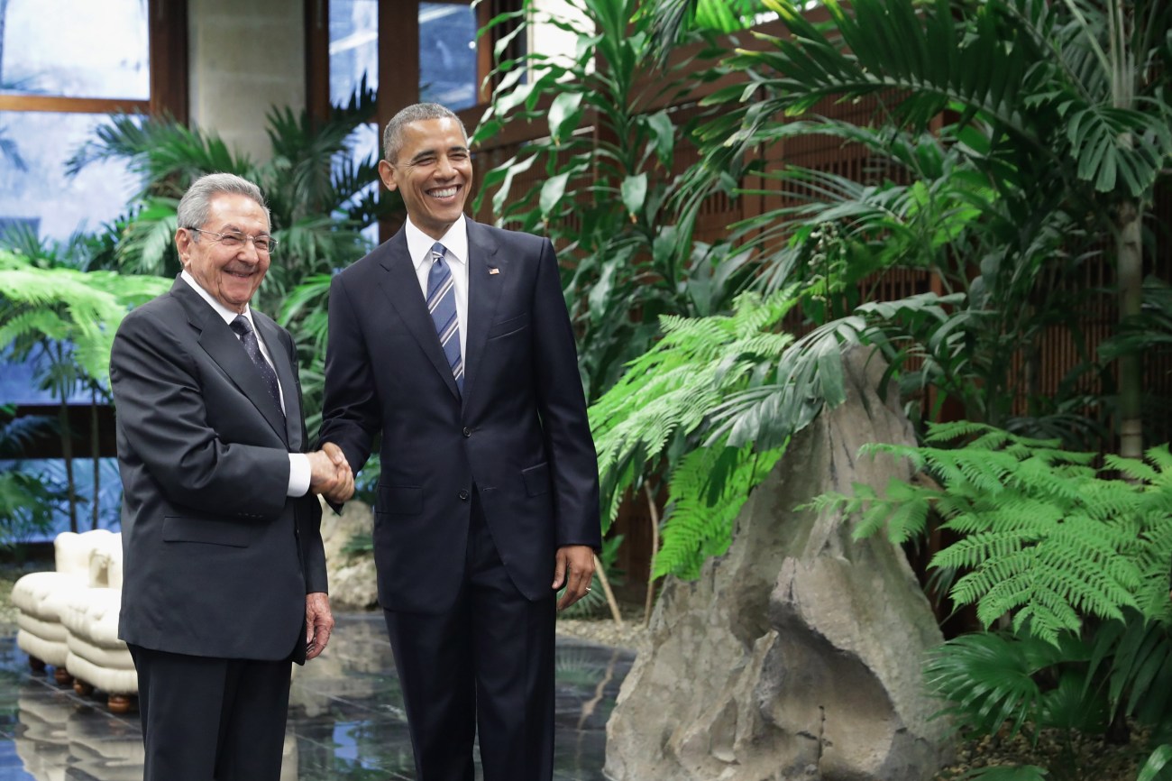 HAVANA, CUBA - MARCH 21: U.S. President Barack Obama (R) and Cuban President Raul Castro pose for photographs after greeting one another at the Palace of the Revolution March 21, 2016 in Havana, Cuba. The first sitting U.S. president to visit Cuba in 88 years, Obama and Castro will sit down for bilateral talks and will deliver joint statements to the news media. (Photo by Chip Somodevilla/Getty Images)