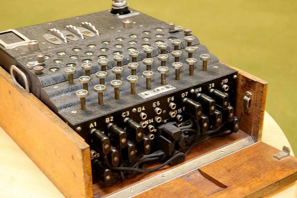 SCARBOROUGH, ENGLAND - JULY 30: A WWII Enigma coding machine on display in the museum at GCHQ Scarborough during a visit by Prince Charles, Prince of Wales on July 30, 2014 in Scarborough, England. The Prince of Wales is patron of the Intelligence Services and visited Government Communications Headquarters (GCHQ) Scarborough to commemorate the centenary of the oldest existing intercept station in the world. The Prince met staff and also viewed the stations museum. (Photo by Christopher Furlong - WPA Pool /Getty Images)