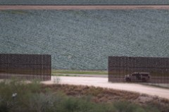 MCALLEN, TX - JANUARY 05: A U.S. Border Patrol vehicle sits waiting for illegal immigrants at a fence opening near the U.S.-Mexico border on January 5, 2017 near McAllen, Texas. The number of incoming immigrants has surged ahead of the upcoming Presidential inauguration of Donald Trump, who has pledged to build a wall along the U.S.-Mexico border. (Photo by John Moore/Getty Images)