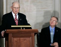 WASHINGTON - JULY 17:  Agricultural scientist Norman E. Borlaug speaks as U.S. Senate Majority Leader Sen. Harry Reid (D-NV) looks on during a Congressional Gold Medal presentation ceremony July 17, 2007 on Capitol Hill in Washington, DC. Borlaug, a 1970 Nobel Peace Prize recipient, was awarded the medal for his work on developing a strand of disease-resistant wheat, in turn increasing food supply throughout the world.  (Photo by Alex Wong/Getty Images)