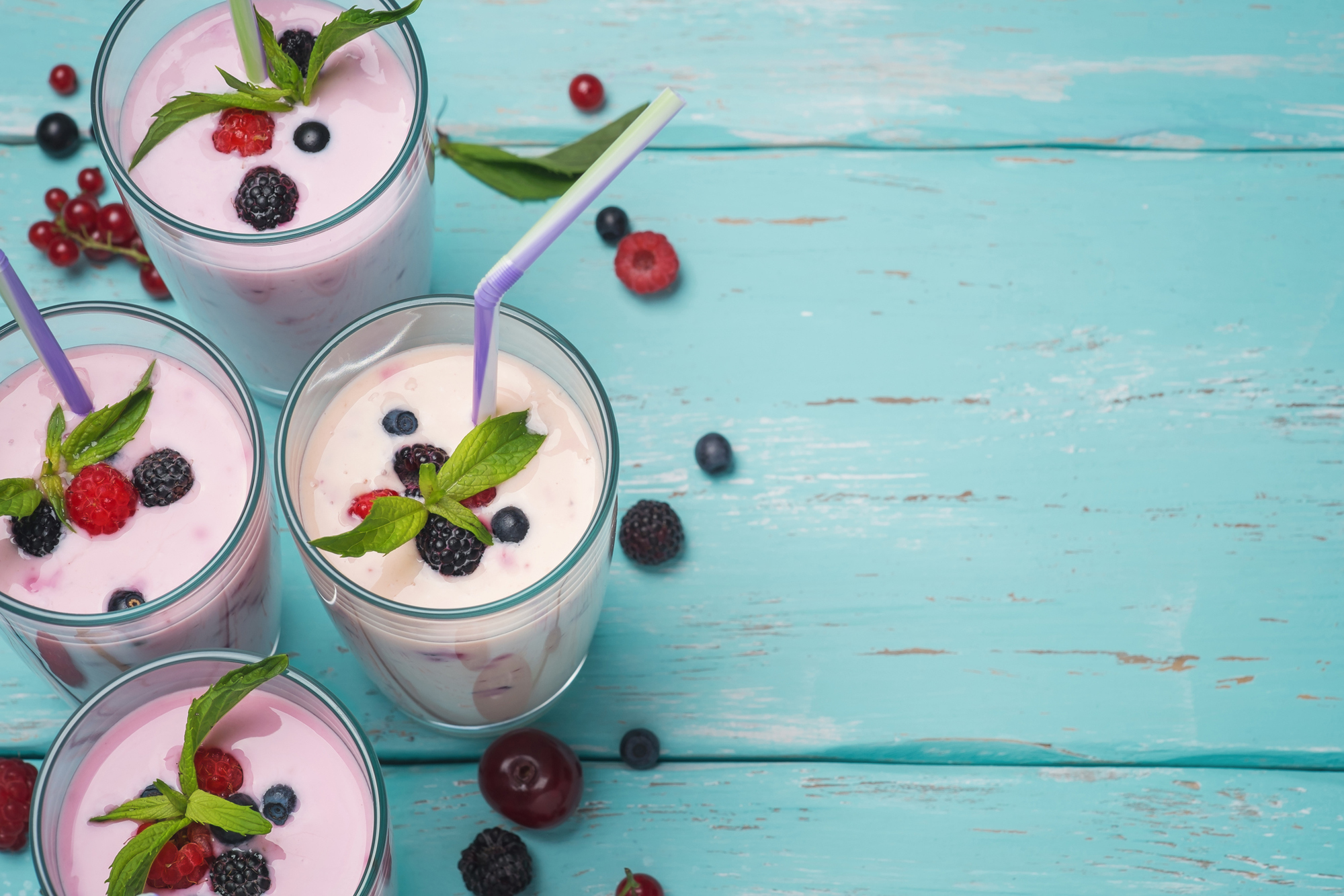 Dairy cocktail with berries. Space for text