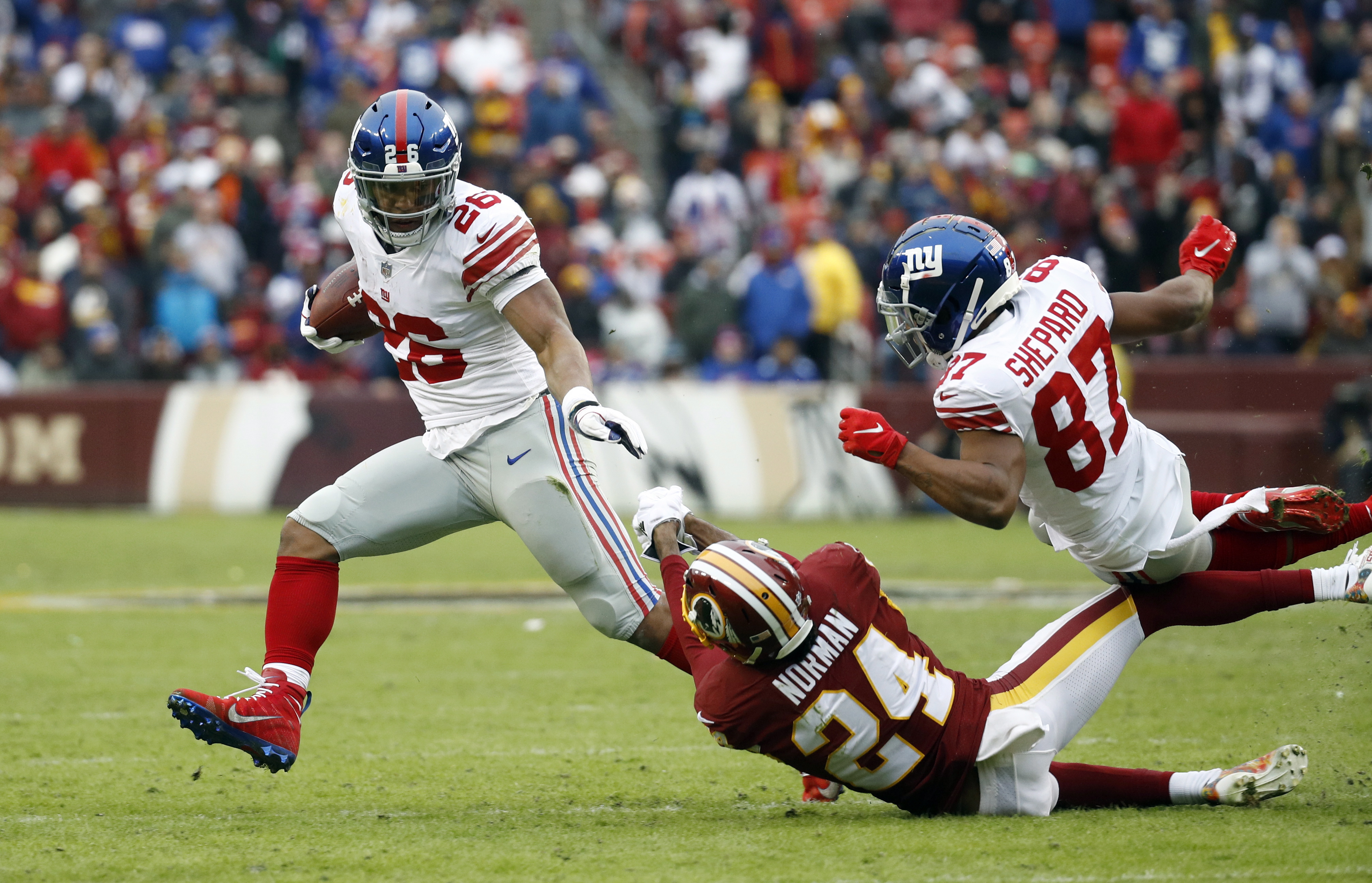 Saquon Barkley et Josh Norman