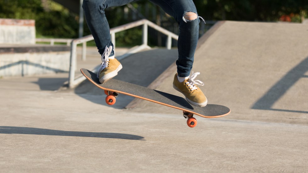 skateboarder skateboarding on skate park