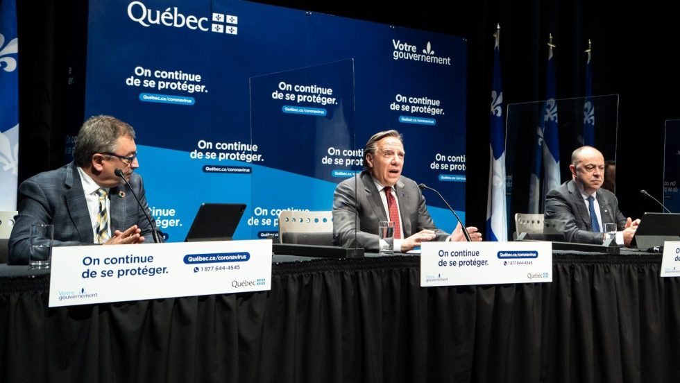 Le Premier ministre François Legault, le Dr Horacio Arruda et le ministre de la santé et des services sociaux Christian Dubé