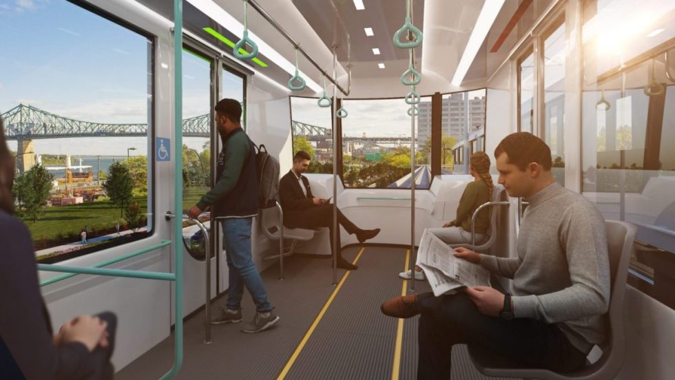 Maquette montrant des passagers assis dans un train du futur REM de l'Est, qui sera construit selon un tracé aérien.