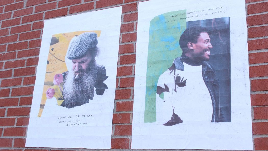 Des portraits sont exposés sur les murs et les vitrines de la rue Ontario.