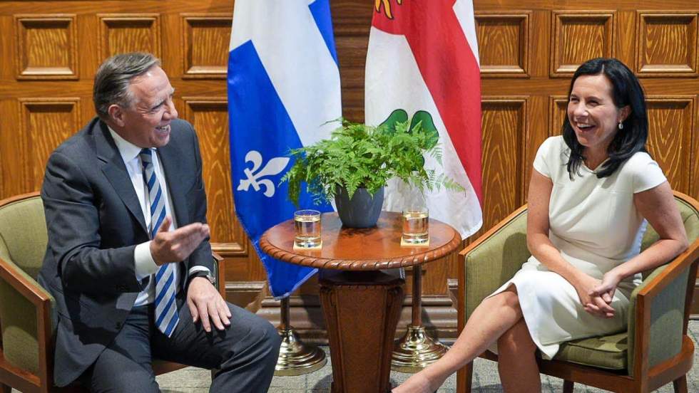 François Legault et Valérie Plante assis à l'hôtel de ville de Montréal