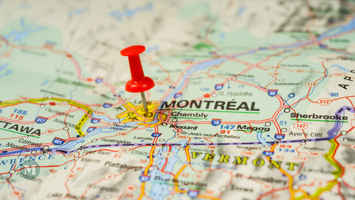 Carte routière montrant une partie de l'est de l'Amérique du Nord, avec une punaise rouge indiquant Montréal.