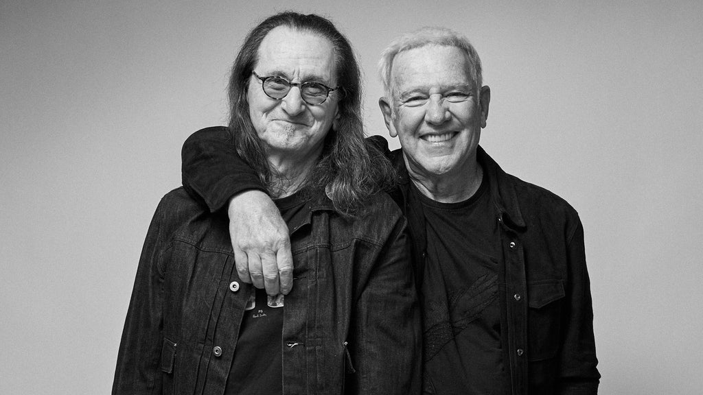 Photo en noir et blanc de Geddy Lee et Alex Lifeson du groupe Rush.